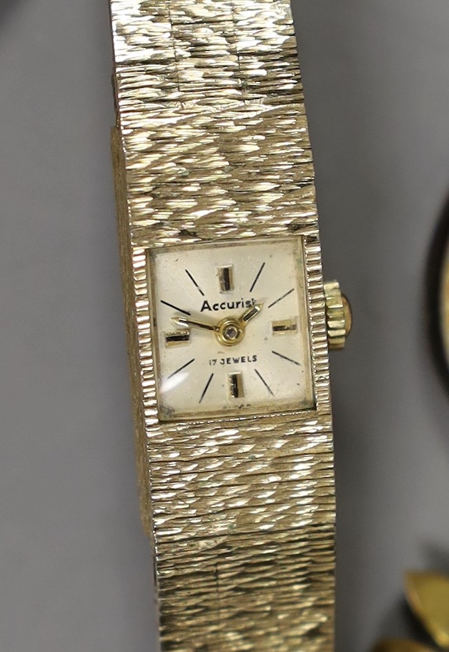 Sundry watches and jewellery including a white metal open face pocket watch and fob watch, three lady's wrist watches including one 9ct gold cased, three costume rings, a bangle, assorted watch keys and a lady's enamelle